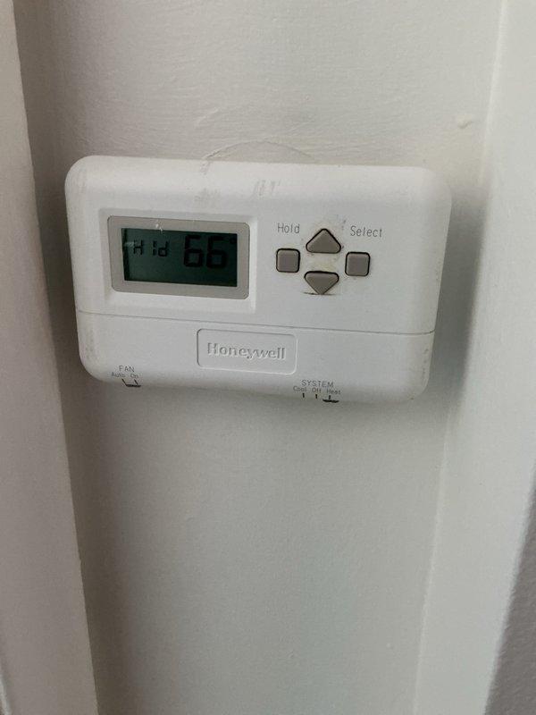Completed comprehensive tune-up and inspection on approximately 10-year-old heating and cooling system located on first floor. Performed full diagnostic evaluation of gas furnace, confirmed proper ignition sequence with burners firing cleanly and uniformly, verified heat exchanger integrity, and tested thermostat operation and calibration. Inspected air conditioning unit, checked refrigerant levels, cleaned condenser coils, and verified proper system cycling and temperature differential across evaporator coil.