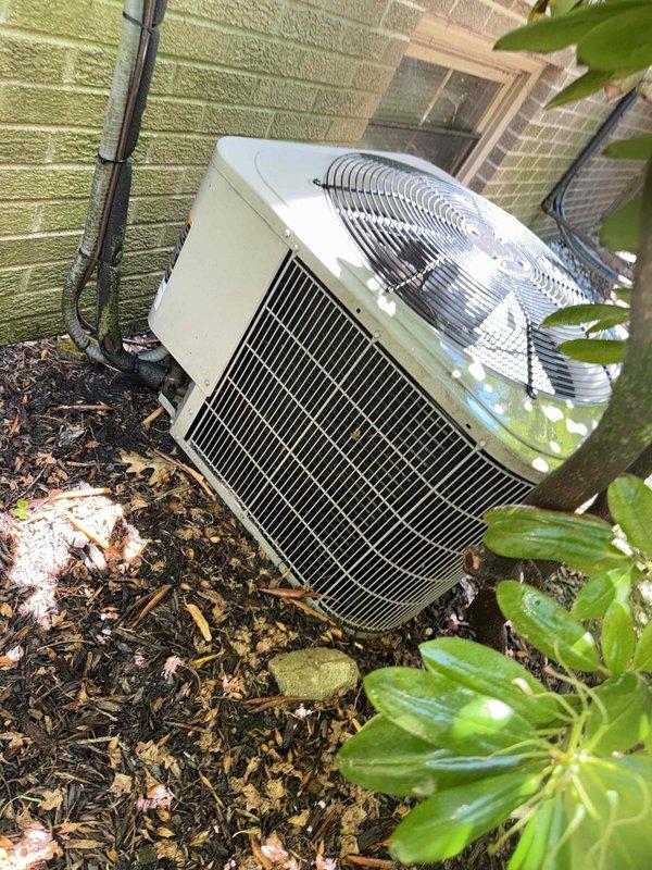 Completed comprehensive Gold AC inspection on 10+ year old residential air conditioning system with air handler located in basement. Performed visual inspection of outdoor condenser unit, which was found to be operational and positioned against building exterior in landscaped area. Conducted electrical diagnostics using digital clamp meter to verify proper amperage draw and system performance. Unit showed normal wear consistent with age, with exterior surfaces displaying minor dirt accumulation. Verified proper airflow through condenser coil fins and fan operation. All refrigerant lines and electrical connections were inspected and found secure. System operating within normal parameters at time of inspection.