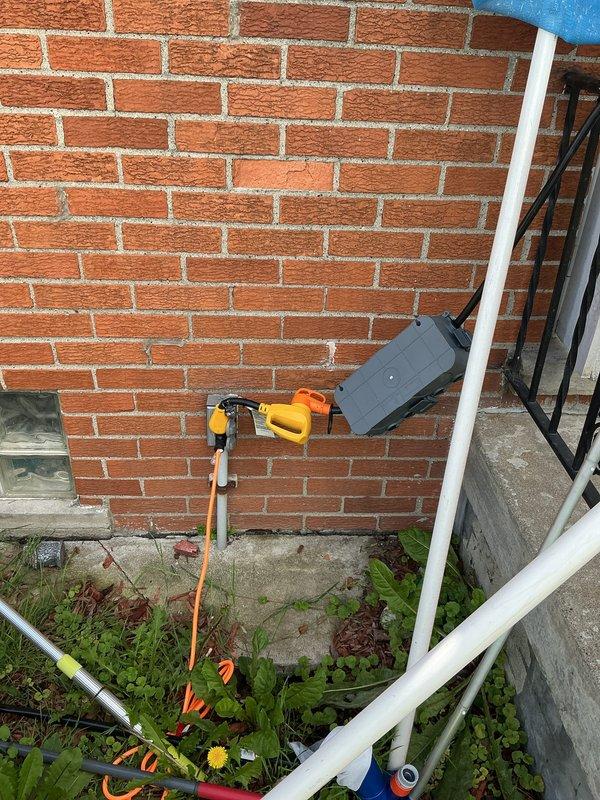 Conducted on-site evaluation for generator transfer switch installation at residential property. Customer currently operates portable generator with extension cords and requested estimate for permanent transfer switch solution. Assessed existing electrical service panel location, meter base configuration, and optimal routing path for generator inlet connection. Documented current electrical infrastructure including exterior conduit runs, service entrance equipment, and available mounting locations for transfer switch and generator inlet box. Evaluated wire path requirements from proposed transfer switch location to exterior generator connection point, accounting for building penetrations and code-compliant installation methods. Photographed existing electrical service equipment and exterior wall conditions to determine material requirements and labor scope for complete installation.