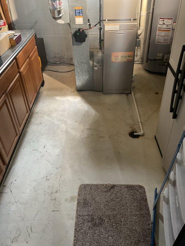 Successfully installed a complete 2-ton air conditioning system with matching evaporator coil in basement mechanical room. Installation included new outdoor condensing unit positioned at rear of property, indoor coil mounted to existing Plus 90b furnace, and all necessary refrigerant line sets with proper insulation. Reconnected humidifier to new system and verified proper integration with existing ductwork. All mechanical and electrical permits obtained and work completed to code specifications.