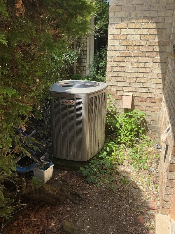 Performed complimentary second opinion diagnostic on residential split system with Lennox outdoor condenser unit and basement-mounted furnace/evaporator coil assembly. Verified previous diagnosis findings regarding weak capacitor and refrigerant leak in evaporator coil. Conducted visual inspection of outdoor unit positioned in side yard area and indoor air handler system. Confirmed low refrigerant charge through system pressure testing. Assessed capacitor performance and documented evaporator coil leak condition requiring repair or replacement to restore proper system operation.