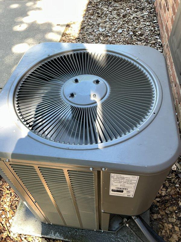 Completed comprehensive Gold AC Tune-Up on 3-year-old outdoor condensing unit per annual maintenance schedule. Performed full system inspection including electrical connections, refrigerant pressures, compressor operation, condenser coil cleaning, and fan motor assessment. Unit operating within manufacturer specifications with no deficiencies noted; all components functioning properly with adequate airflow through clean condenser coil and properly secured fan assembly.