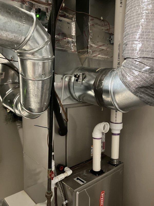 Responded to no cooling complaint on 10-year-old basement air conditioning system. Conducted comprehensive assessment of existing HVAC equipment, ductwork configuration including rigid metal and flexible ducting components, and electrical service panel. Provided replacement estimate for complete system upgrade to address cooling failure and aging equipment concerns.
