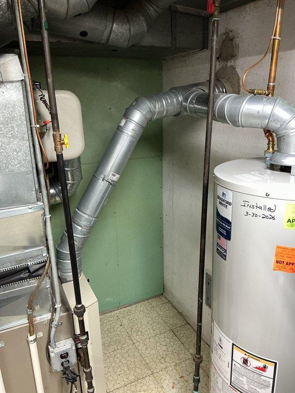 Responded to mechanical room inspection requiring code compliance corrections. Installed proper combustion air provisions to meet IFGC2021 Section 305.1 and MRC2015 Section 2407 requirements for safe operation of gas-fired water heater. Piped water heater drain pan to approved drainage point per MRC2015 Section 1307.1, ensuring proper condensate and emergency overflow discharge. Water heater installation now meets current plumbing and mechanical code standards with all required safety measures in place.