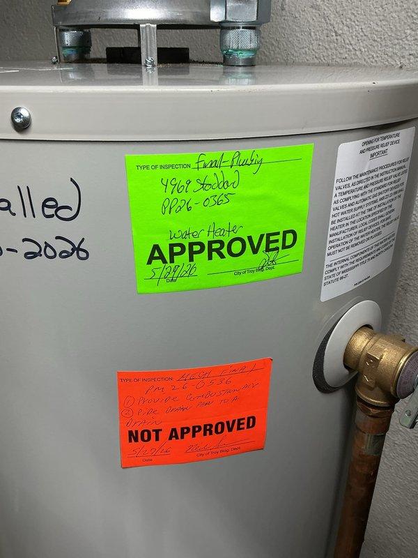 Responded to mechanical room inspection requiring code compliance corrections. Installed proper combustion air provisions to meet IFGC2021 Section 305.1 and MRC2015 Section 2407 requirements for safe operation of gas-fired water heater. Piped water heater drain pan to approved drainage point per MRC2015 Section 1307.1, ensuring proper condensate and emergency overflow discharge. Water heater installation now meets current plumbing and mechanical code standards with all required safety measures in place.