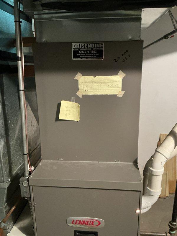 Conducted estimate for furnace replacement on 15-year-old Lennox unit located in basement. Inspected existing HVAC system configuration including air handler, furnace, condensate drainage system, electrical connections, and gas lines. Documented current equipment specifications, manufacturer labels, and installation setup with photographs for replacement proposal development.