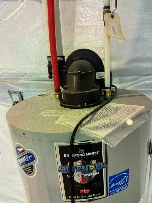 Completed Gold AC inspection on 2023 mini split system located in basement. Verified operational status of air handler and coil assembly, performed visual inspection of refrigerant lines, electrical connections, and condensate drainage. Inspected Bradford White water heater and associated HVAC humidifier control system during comprehensive equipment assessment. All equipment found in good working condition with no deficiencies noted.