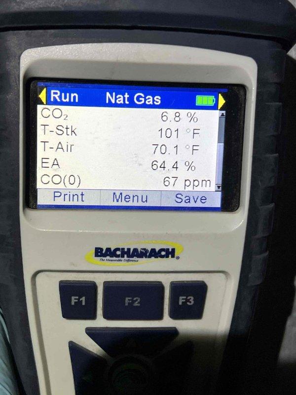 Performed comprehensive furnace inspection on Bryant unit to assess overall condition and determine viability for continued operation versus replacement. Conducted combustion analysis using Bacharach analyzer, recording CO₂ levels at 6.8%, stack temperature at 101°F, ambient air at 70.1°F, excess air at 64.4%, and CO readings at 67 ppm, all within acceptable parameters for natural gas combustion. Verified unit levelness and inspected cabinet condition, ductwork connections, and surrounding installation environment. Included inspection of associated humidifier, thermostat operation, and hot water tank as requested. All systems evaluated and findings documented with diagnostic readings and equipment photos for replacement decision consideration.