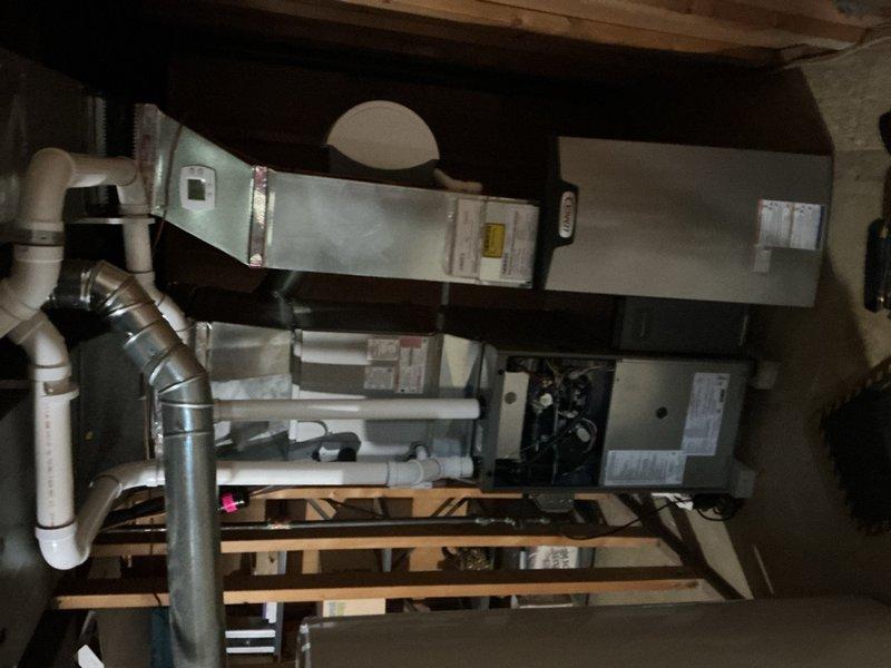 Completed comprehensive Gold AC Inspection on 8-year-old residential HVAC system with air handler located in attic space. Performed full system evaluation including inspection of air handler unit, ductwork connections, condensate drain lines, and refrigerant lines. All equipment found to be operating within normal parameters with no immediate service needs identified at time of inspection.