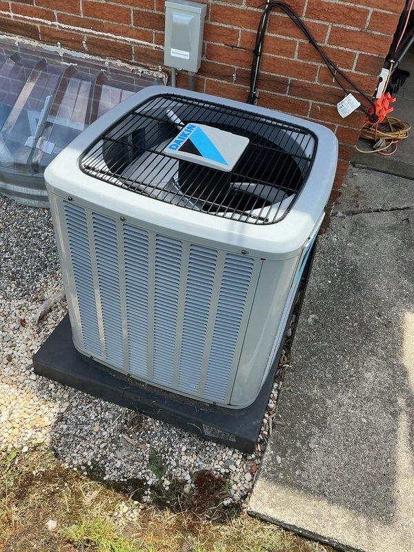 Completed comprehensive Gold Plan AC tune-up and maintenance inspection on 5-year-old Daikin system with warranty valid through April 2027. Performed full system evaluation including condenser unit inspection, electrical connections check, refrigerant level assessment, and airflow verification. System operating properly with no deficiencies noted; unit positioned on proper pad with adequate clearance, disconnect box accessible, and all components functioning within normal parameters.