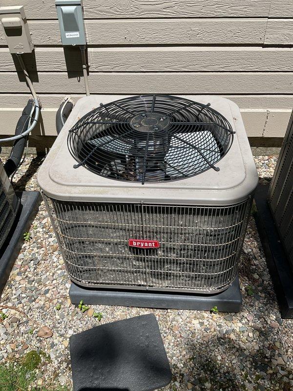 Completed annual air conditioning maintenance on Bryant brand outdoor condenser unit. Performed comprehensive AC tune-up including system inspection, cleaning, and testing of all components. Inspected and replaced air filter with clean pleated media filter. Verified electrical connections at disconnect box, checked refrigerant levels, and confirmed proper operation of condenser fan and compressor. System operating within normal parameters upon completion of preventive maintenance service.