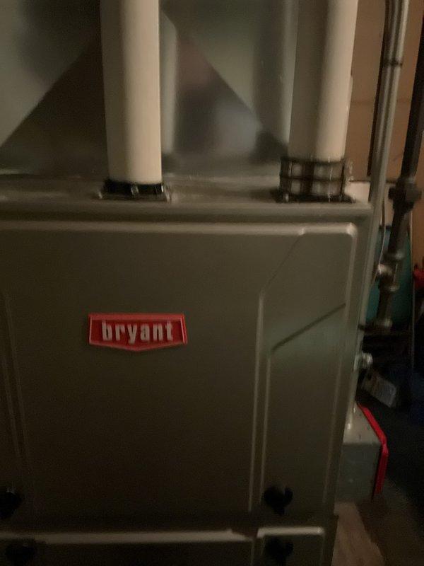 Responded to warranty callback for recently installed Bradford White tank water heater experiencing internal leak. Confirmed failure by removing burner door and inspecting unit, finding water leakage from tank itself requiring full warranty replacement. During inspection, also identified new leak at connection point on 3-inch PVC exhaust pipe at top of nearby HVAC unit. Leak appears to have resulted from physical contact during previous installation work, as no prior signs of moisture or deterioration were present on PVC connections. Documented both issues with photographic evidence showing water heater installation with copper supply lines and HVAC system with white PVC venting. Coordinated with office to schedule follow-up appointment for warranty tank replacement and repair of damaged PVC exhaust connection.