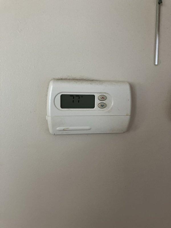 Responded to no cooling complaint on 7-year-old central air conditioning system. Performed diagnostic evaluation of outdoor unit and indoor thermostat set at 77°F. Assessed system components, measured equipment clearances, and inspected refrigerant lines showing signs of age. Provided replacement estimate for complete HVAC system due to unit age and cooling performance issues.