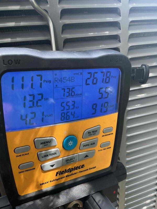 Completed installation of 2-ton air conditioning system with evaporator coil at rear location. Installed ML13KC1-024-230A03 condenser unit and CK4DCT-18/24A-71 evaporator coil, reconnected electrical service, and performed refrigerant charging and system startup. Verified proper system pressures, superheat, and subcooling readings using digital manifold gauges, confirming all operating parameters within manufacturer specifications. Installation completed per mechanical and electrical permits, with all equipment properly labeled and system operational.