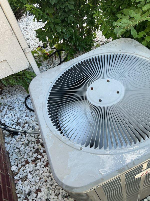 Completed comprehensive Gold AC Inspection on an 8-10 year old residential air conditioning system with outdoor condenser unit and basement air handler. Performed visual inspection of condenser unit exterior, verified proper fan assembly operation, inspected electrical compartment including capacitor and contactor connections, checked all wire terminations and electrical components for signs of wear or damage. Unit found to be in operational condition with all electrical components functioning within normal parameters.