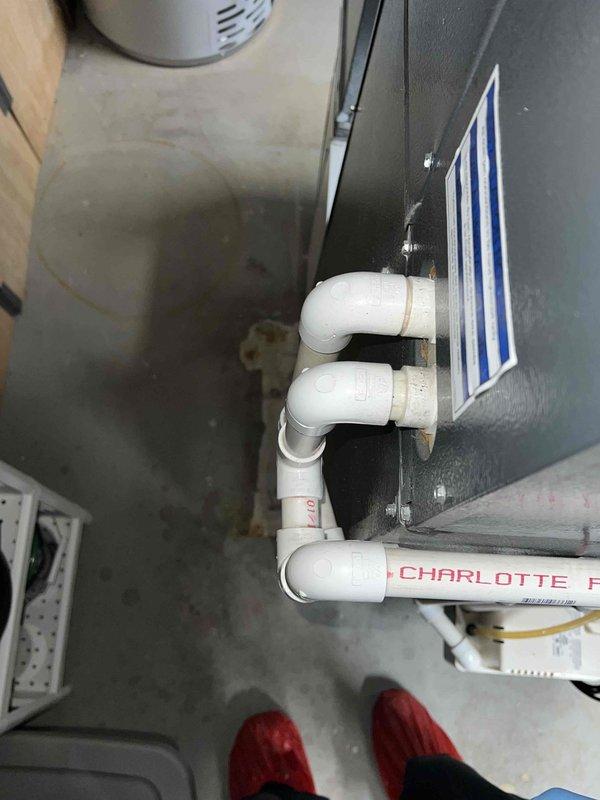 Completed comprehensive Gold AC inspection on 11-year-old single-zone system with air handler located in basement. Performed full system evaluation including electrical component testing of capacitor and CoreSense diagnostic module for Copeland scroll compressor, verified proper operation of all controls, inspected condensate drain piping and PVC discharge lines, and documented equipment condition through photographic records. All equipment found operating within normal parameters with no immediate service needs identified.