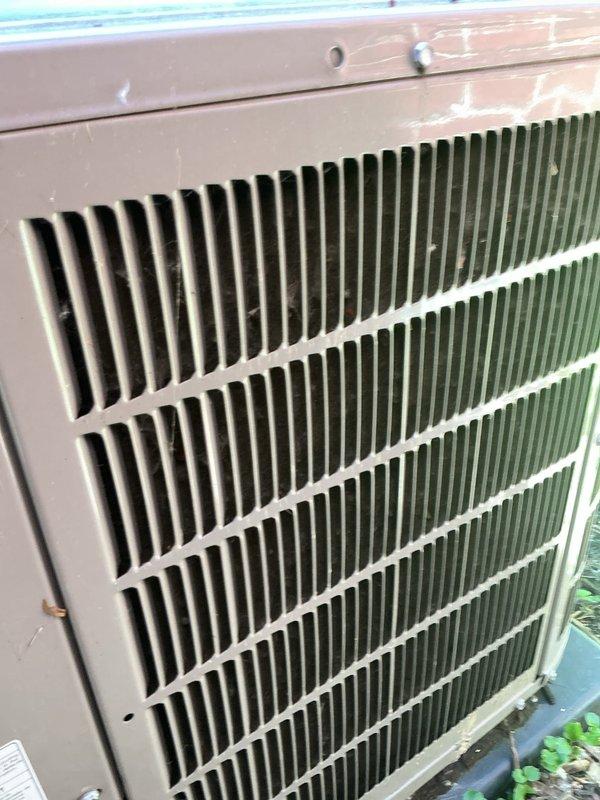 Responded to no cooling complaint on 5-year-old AC system with non-operational outdoor condenser unit. Performed comprehensive leak search using nitrogen pressurization and refrigerant tracing methods to diagnose system failure. Inspected outdoor condenser unit, noting accumulated dirt and debris on heat exchanger coil fins and exterior surfaces consistent with normal outdoor weathering. Unit showed signs of extended outdoor exposure with moderate dust and dirt accumulation affecting airflow efficiency. Conducted systematic pressure testing and leak detection procedures to identify potential refrigerant loss points in condenser assembly and associated refrigerant lines. Equipment remains under manufacturer warranty coverage for qualifying repairs beyond normal wear and tear conditions.
