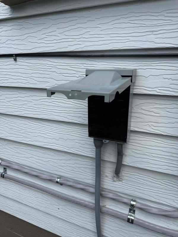 Completed comprehensive Gold AC inspection on 10+ year old residential air conditioning system with air handler located in basement. Performed thorough evaluation of outdoor condensing unit including temperature differential measurements, verified proper electrical connections at exterior disconnect, and inspected refrigerant line sets and mounting hardware. System operating within normal parameters at time of inspection, with all components functioning as designed.
