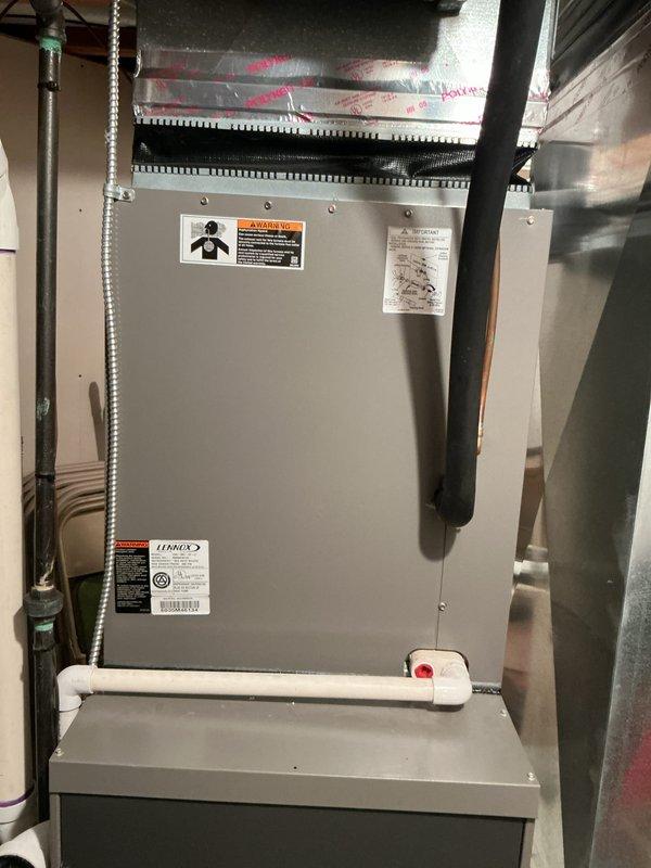 Completed comprehensive HVAC system inspection and estimate for full system replacement on 20+ year old Lennox air handler unit located in basement. Both heating and cooling components have exceeded their expected service life and require replacement. Documented existing equipment configuration, ductwork connections, electrical service, and drainage system to provide accurate proposal for new high-efficiency system installation.