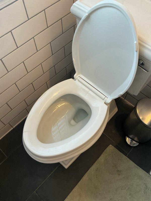 Responded to a toilet leaking at the base during flushing. Upon inspection, removed and reset the toilet, replaced the deteriorated wax ring seal, and reinstalled the closet bolts to ensure a proper watertight seal between the fixture and the floor flange. Tested the toilet through multiple flush cycles to verify the leak was resolved and confirmed no water discharge at the base.
