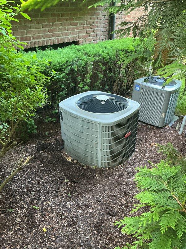 Completed comprehensive Gold AC Inspection maintenance service on four outdoor air conditioning condensing units. Performed thorough system evaluations including visual inspections, electrical component checks, refrigerant level assessments, and airflow measurements on all units. Inspected Carrier brand equipment and additional condensing units positioned on concrete pad and gravel surfaces respectively. Verified proper operation of condenser fans, examined cabinet conditions, and assessed louver panel ventilation systems. Documented equipment conditions through photography showing units in good operational status with no visible signs of damage, rust, or deterioration. Noted capacitor on order under existing purchase order and coordinated with shop regarding air filter availability. All four systems assessed for seasonal performance readiness with routine preventative maintenance protocols completed per Gold service standards.