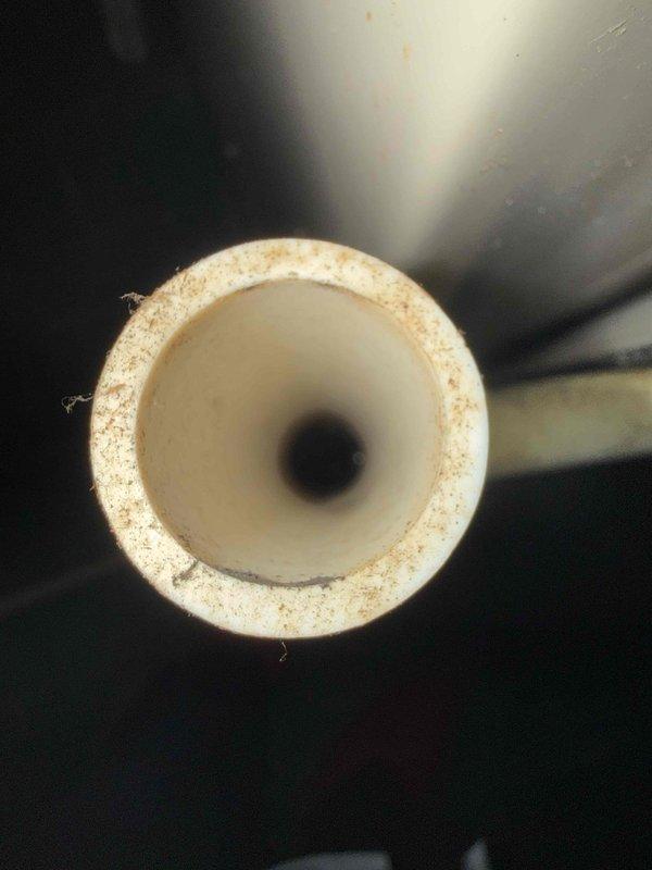 Completed comprehensive HVAC tune-up and inspection on residential system with outdoor condensing unit located in basement area. Performed thorough examination of air conditioning condenser including inspection of condenser coils, refrigerant lines, electrical connections, and proper drainage through PVC condensate line. Additionally inspected humidifier, thermostat operation, and hot water tank as requested, ensuring all components functioning within normal parameters and system ready for continued operation.