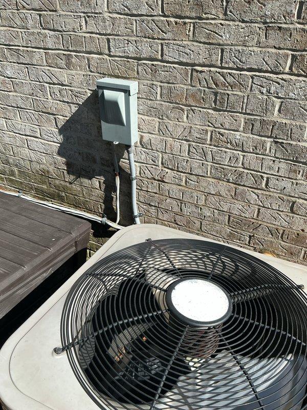 Completed comprehensive Gold AC Inspection on two residential outdoor condensing units (5 and 8 years old) during scheduled early morning maintenance visit. Performed complete system evaluation including electrical connections at disconnect boxes, conduit inspection, refrigerant level verification, compressor operation assessment, and condenser coil cleaning. Accessed internal components on both units, conducted multi-point performance testing, verified proper airflow through fan assemblies, and ensured all mechanical and electrical systems operating within manufacturer specifications.