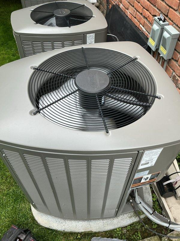 Completed comprehensive Gold AC inspection on three residential air conditioning units installed in 2018. Performed thorough examination of all outdoor condenser units, verified proper operation of fan motors and compressors, inspected electrical connections and disconnect boxes, checked refrigerant line integrity, and confirmed adequate clearances around equipment. All units positioned on proper concrete pads with appropriate drainage. Inspected basement-located air handler and evaporator coil for proper airflow and condensate drainage. All three systems operating within normal parameters with no immediate service needs identified at time of inspection.