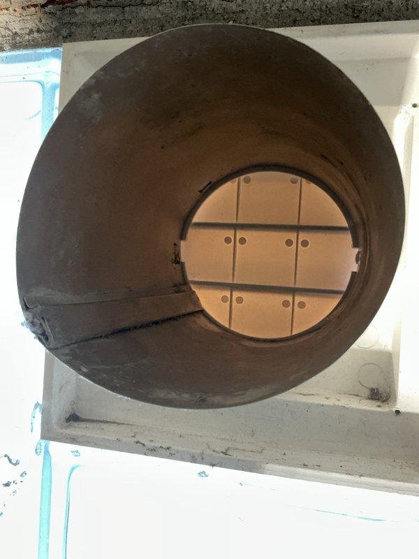 Responded to service call for disconnected dryer vent system. Upon inspection, found flexible duct hose detached from ceiling-mounted exhaust vent cover in bathroom/utility area. Replaced deteriorated tubing with new rigid or semi-rigid vent ducting and securely connected to exterior vent cover, ensuring proper seal and airflow. Verified ventilation system operates correctly with no air leaks at connection points.