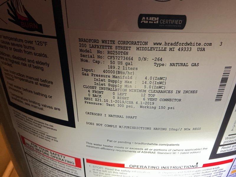 Responded to service call for 13-year-old Bradford White 50-gallon natural gas water heater (Model RG250T6N) experiencing active leaking from top connections and suspected bottom tank failure. Upon inspection in basement utility room, confirmed multiple leak points indicating tank integrity compromise. Due to age of unit (manufactured 2012) and extent of damage, recommended full water heater replacement. Noted that new installation will require addition of drain pan for code compliance, which was not present on existing unit. Documented existing plumbing configuration including copper supply lines, gas connections, and metal vent ducting for replacement specifications.