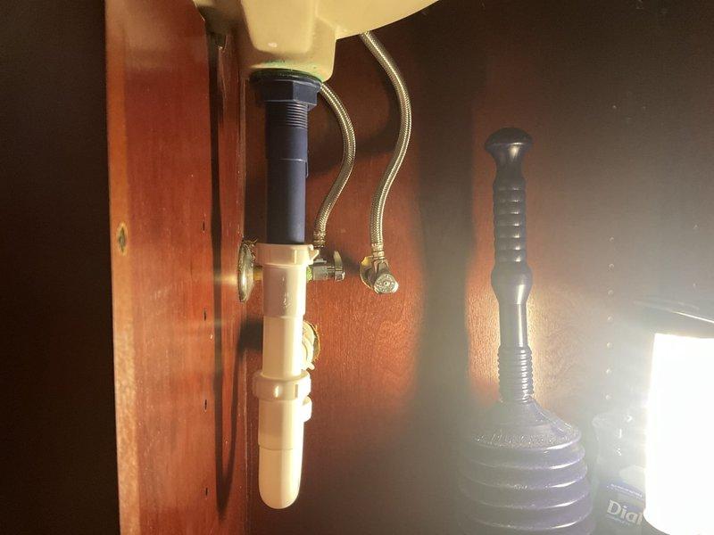 Completed shower valve replacement requiring wall access. Cut access panel in bathroom wall to expose existing plumbing infrastructure and removed failed shower valve assembly. Installed new brass shower valve with copper pipe connections, ensuring proper positioning and secure mounting to wall studs. Soldered all copper joints and tested system for leaks. Verified proper hot and cold water flow and temperature control operation. Left access panel open for customer inspection prior to drywall repair.