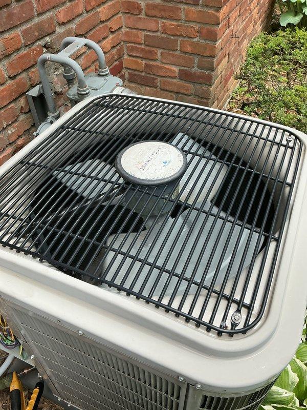Completed annual Gold Plan maintenance and comprehensive AC tune-up on Armstrong air conditioning system. Performed thorough inspection of outdoor condenser unit, confirmed all components operating within normal parameters, system cooling properly with no deficiencies noted. Unit found in clean, well-maintained condition with protective grille intact and all electrical connections secure.