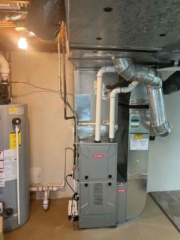 Performed leak search on residential HVAC system in response to customer concern. Conducted thorough inspection of Bryant furnace, associated ductwork, refrigerant lines, and condensate drainage system. Documented equipment condition and connections with photos for service records.