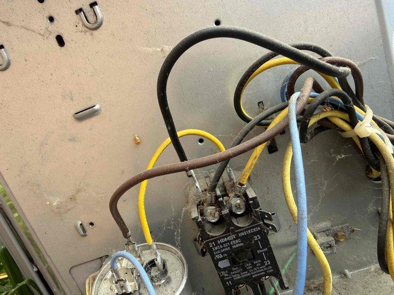 Responded to no cooling call and found outdoor AC unit not operating. Upon inspection, identified failed dual run capacitor preventing compressor and condenser fan from starting. Replaced defective capacitor with proper rated replacement, restoring power to both compressor and condenser fan motor. Verified system startup, confirmed proper amperage draw on both components, and tested full cooling cycle operation. Unit now cooling normally with all components functioning as designed.
