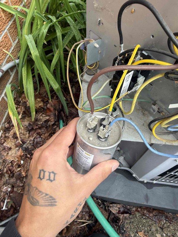 Responded to no cooling call and found outdoor AC unit not operating. Upon inspection, identified failed dual run capacitor preventing compressor and condenser fan from starting. Replaced defective capacitor with proper rated replacement, restoring power to both compressor and condenser fan motor. Verified system startup, confirmed proper amperage draw on both components, and tested full cooling cycle operation. Unit now cooling normally with all components functioning as designed.