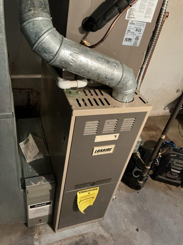 Completed heating maintenance tune-up on Luxaire furnace system. Performed comprehensive system inspection including thermostat operation verification, burner assembly examination, heat exchanger inspection, blower motor assessment, and air filter evaluation. System tested and confirmed operating properly with all components functioning within normal parameters.