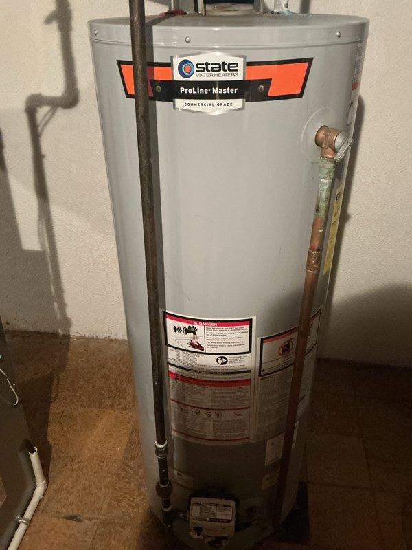 Completed comprehensive Gold AC Inspection on residential cooling system with basement-located air handler and outdoor condenser unit. Performed thorough multi-point inspection including visual examination of outdoor condenser unit positioned on concrete pad, verified proper clearances and surrounding vegetation, inspected electrical disconnect box and conduit connections, and assessed indoor air handler components. System found to be operational with all equipment functioning within normal parameters at time of inspection.