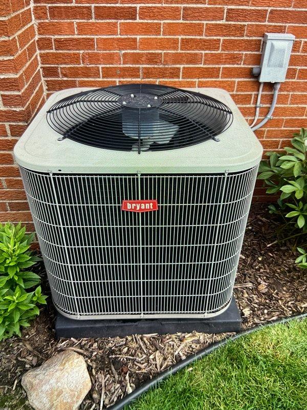 Completed comprehensive Gold AC Inspection and tune-up on 11-year-old Bryant split system with air handler located in basement and condenser unit positioned exterior on pad against brick wall. Performed full system evaluation including inspection of ductwork connections, flexible insulated ducts, metallic transitions, condensate drain lines, electrical disconnect, and outdoor unit components. System operating within normal parameters; all components inspected, cleaned, and verified for proper function with no immediate service needs identified at this time.