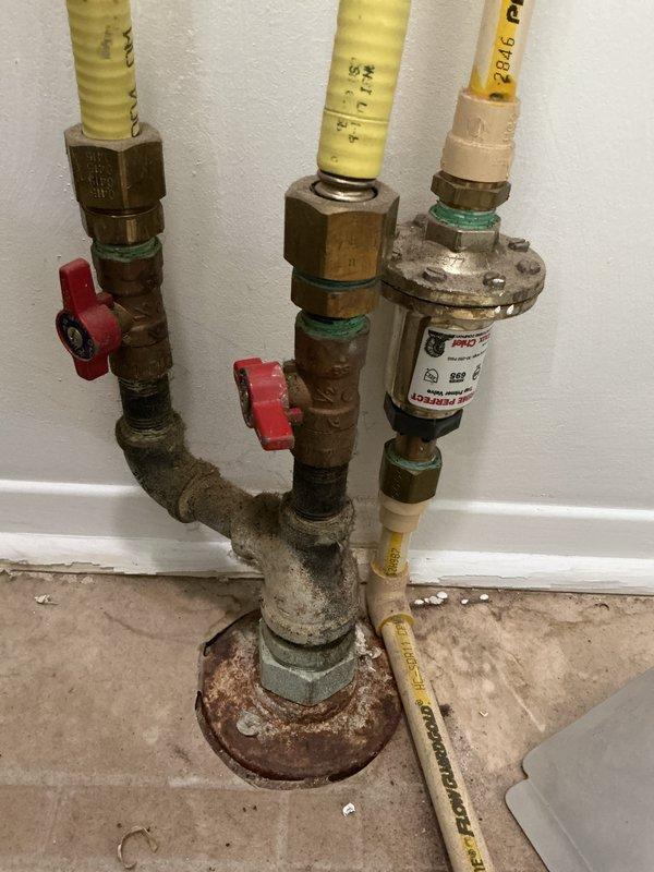 Completed comprehensive tune-up and city certification inspection on 10+ year old furnace and air conditioning system located in basement. Performed full system evaluation including inspection of Carrier heating unit, air handler, and associated ductwork. Verified proper operation of gas supply manifold with multiple branch lines, confirmed functionality of shut-off valves and pressure regulation equipment. Inspected all electrical connections, tested safety controls, and verified proper airflow through ductwork and ventilation systems. Noted existing corrosion on gas line floor flange and base connections, though components remain functional. Cleaned and inspected blower assembly, checked refrigerant levels, tested thermostat operation, and verified proper cycling of both heating and cooling modes. All duct connections properly sealed with foil tape, no air leakage detected. System operating within manufacturer specifications and meets requirements for municipal certification. Equipme