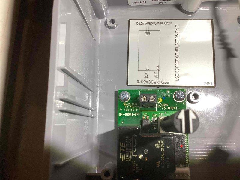 Responded to recurring issue with generator priority box disabling air conditioning system on 3-year-old Briggs and Stratton 20kW natural gas generator with 150 amp automatic transfer switch. Inspected control board and relay components within priority management module, identified faulty relay causing improper load shedding sequence that was preventing AC operation. Removed defective controller unit for shop repair/replacement, documented existing installation specifications including transfer switch configuration with AC circuits and 220-volt modules. Upon controller replacement, will test automatic transfer switch operation, verify proper load prioritization sequence, and ensure AC system functions correctly during generator runtime.