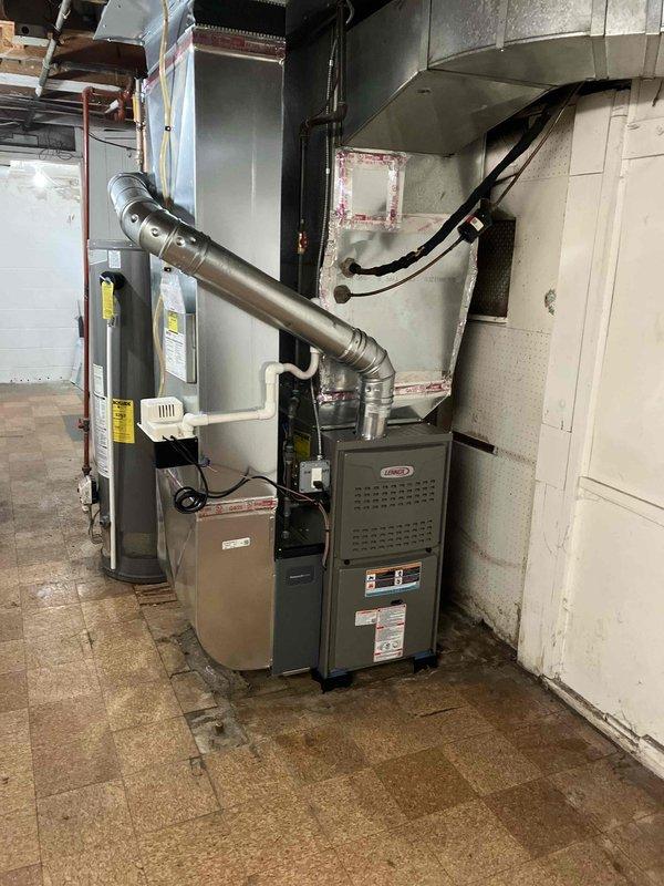 Completed installation of 70,000 BTU Lennox furnace unit in residential basement mechanical room. Successfully connected metallic flexible ductwork, ran electrical and mechanical connections, and performed system reconnection per permit requirements. All mechanical, electrical, and furnace permits were requested and installation was verified operational with proper airflow and safety controls functioning as specified.