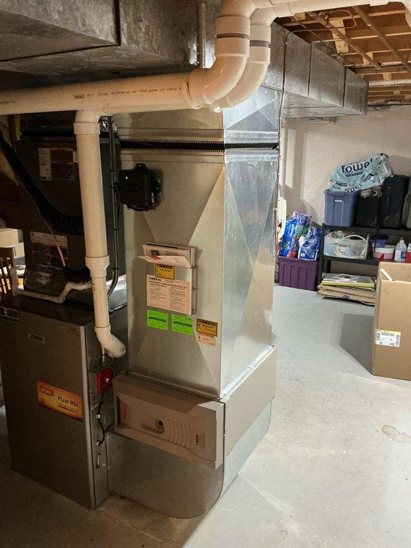 Completed installation of 4-ton air conditioning system with matching evaporator coil in rear yard location. Installed Sensi thermostat, performed refrigerant line flush, and added electrical wiring to support new equipment. Reconnected all necessary utilities and components to existing furnace system in basement. Mechanical permit was secured prior to installation. System was tested and verified operational upon completion, with customer qualifying for available utility rebates.