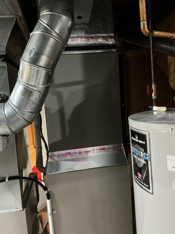 Completed installation of 4-ton air conditioning system with matching evaporator coil in rear yard location. Installed Sensi thermostat, performed refrigerant line flush, and added electrical wiring to support new equipment. Reconnected all necessary utilities and components to existing furnace system in basement. Mechanical permit was secured prior to installation. System was tested and verified operational upon completion, with customer qualifying for available utility rebates.