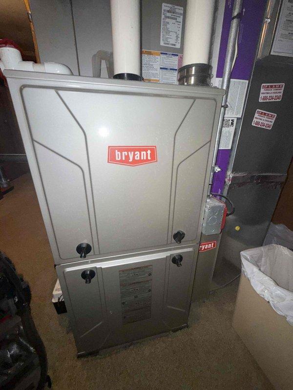 Completed comprehensive Gold Plan AC inspection on 10-year-old Bryant HVAC system with air handler located in basement. Verified system operational status and performed standard tune-up procedures including temperature diagnostics at outdoor condenser unit, recording 81.5°F ambient temperature reading. Inspected furnace cabinet, ductwork connections, venting system, and PVC condensate lines for proper installation and condition. Customer enrolled in Gold Plan maintenance agreement for both air conditioning and furnace systems to ensure continued preventative maintenance coverage.