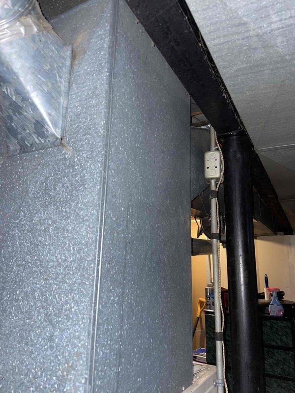 Conducted comprehensive assessment of existing basement-located HVAC system for complete replacement estimate. Current air conditioning unit not operational while aged furnace remains functional. Evaluated natural gas furnace installation, existing ductwork with reflective insulation, electrical infrastructure including panel and wiring requirements, and spatial considerations for new equipment placement in basement mechanical room area.