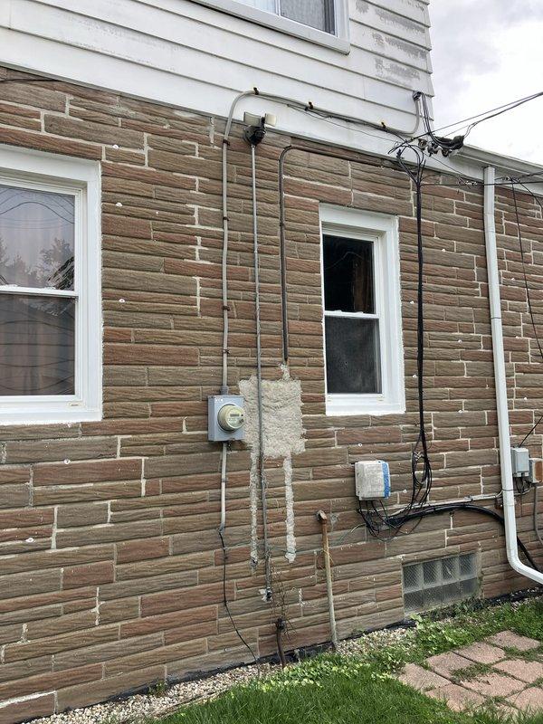 Conducted comprehensive HVAC system evaluation at residential property with basement-located equipment. Performed full system inspection including assessment of existing heating and cooling equipment, humidifier operation, thermostat functionality, and hot water tank condition to provide complete replacement estimate. Documented exterior utility connections and electrical service configurations for new system installation planning.