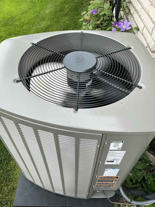 Completed comprehensive annual AC tune-up and inspection on nearly new residential cooling system under Gold Plan maintenance agreement. Performed thorough multi-point inspection of outdoor condensing unit including examination of fan assembly, motor, electrical connections, and cabinet condition. Verified proper operation of all components, confirmed electrical service connections at exterior wall-mounted junction boxes and conduit systems, and documented system condition through photographic records. Unit found to be in excellent operating condition with no deficiencies noted. All safety checks passed and system operating within manufacturer specifications.