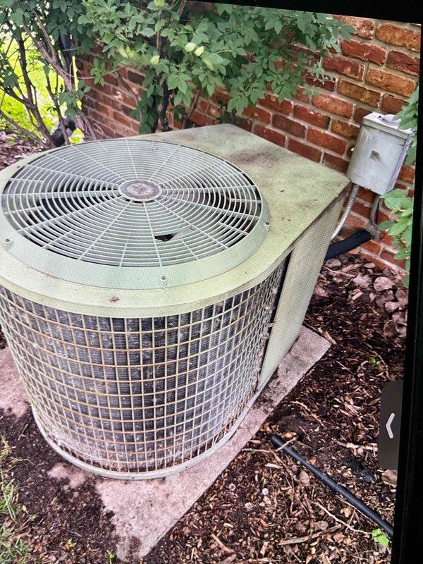 Completed comprehensive tune-up and preventive maintenance on approximately 20-year-old residential air conditioning system with coil-type air handler located in basement. Performed full inspection of outdoor condenser unit, which showed signs of age-related wear and weathering but was operational. Verified proper electrical connections at disconnect box, inspected refrigerant lines, cleaned condenser coils, and assessed overall system performance to ensure efficient cooling operation for the upcoming season.