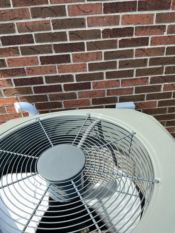 Responded to customer complaint of noise coming from outdoor condensing unit. Upon arrival, coordinated with office regarding service history noting contactor replacement performed one month prior. Conducted thorough inspection of outdoor unit and performed electrical diagnostics using clamp meter to evaluate compressor and fan motor amp draw. Verified proper operation of recently installed contactor and assessed all electrical connections. Inspected condenser fan assembly, including fan blades, motor, and wire guard for signs of wear, debris, or mechanical issues that could cause abnormal noise. System operational at time of inspection with all components running within normal parameters.