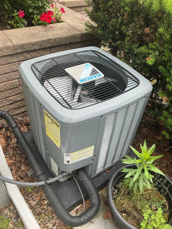 Completed comprehensive Gold AC Inspection on a 4-year-old multi-unit HVAC system with air handler located in basement and outdoor condensing unit. Performed thorough inspection of both indoor and outdoor components, verified operational status of all equipment, documented system conditions with photographic evidence, and confirmed proper functioning of condensing unit with fan operation and refrigerant line connections. All equipment found to be in working order with routine maintenance completed per Gold service protocol.